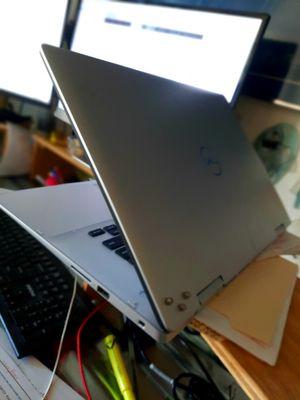 Frank N. Stien , my new laptops name, had a broken hinge at touch screen.  Only visible part of repair is the nuts on the back of the cover.