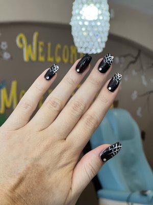 Love the owner's beautiful work! She did an amazing job  The rhinestone accents really makes it pop! I'm ready for Halloween