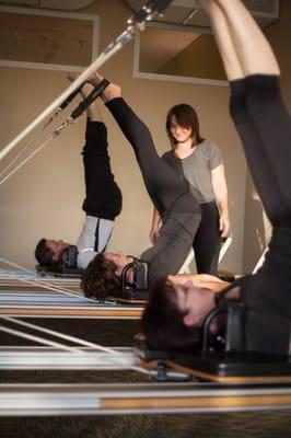 A Pilates Reformer class at Serenity