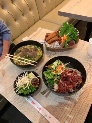 Savory Pork Bowl with rice noodles, Spicy Hue Soup and Froed Pork Egg Rolls