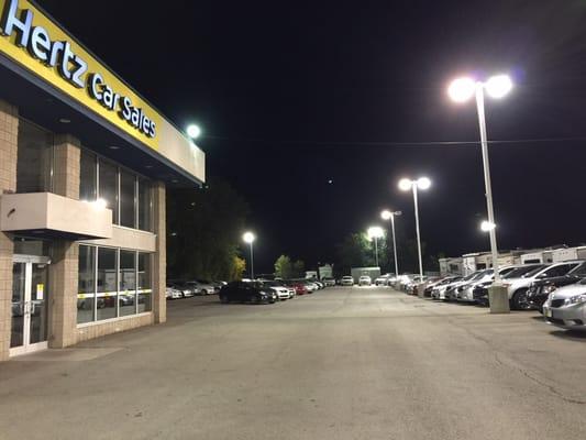 Hertz Car Sales at night.