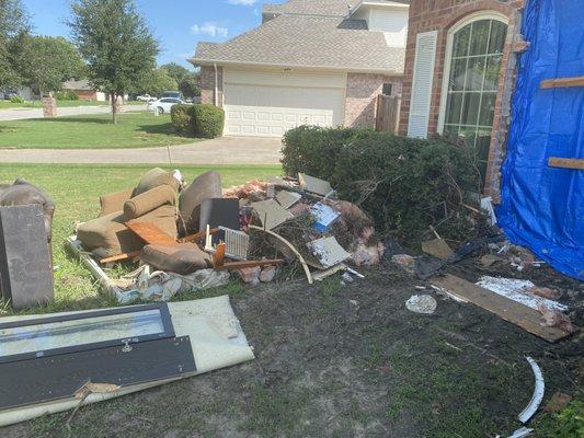 Remodeling of house clean up. Furniture, bricks and other trash.