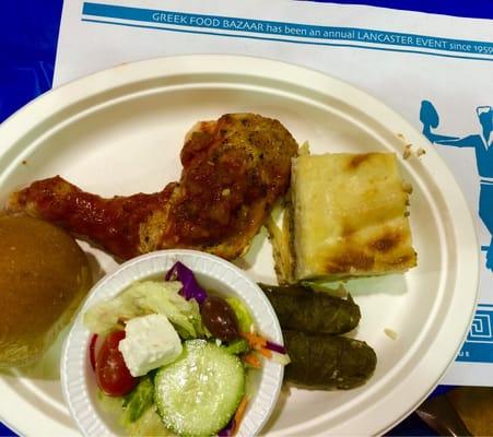 Greek food platter: pastitsio, chicken in Greek sauce, and Yiaprakia.