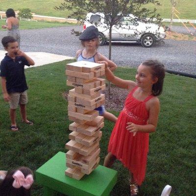 Playing giant Jenga at the wedding reception.