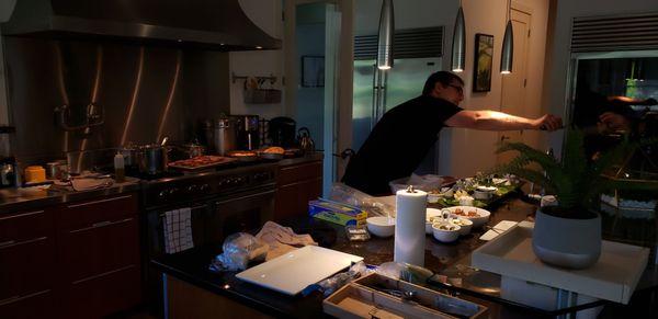 Andrea preparing dinner.