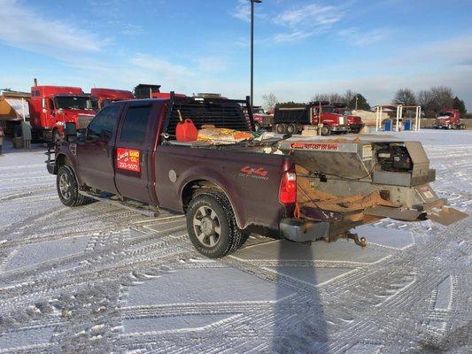 Parking lots covered in snow? Call us! We'll spread salt and sand as well as snow removal services!