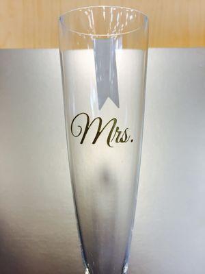 Engraved on crystal champagne flutes - Gold.  Clean leveled work.  Proportional