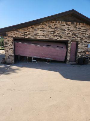 We repaired the garage door and saved having to buy a new one!