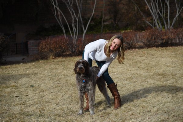 Your trainer, Zoe Bidell and her dog, Crosby.