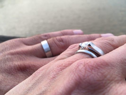 Here is a picture of my beautiful 1 ct platinum, tension set wedding ring!  Also, here is my handsome husband's Palladium band