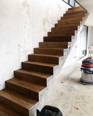 Completed flooring for stairs.