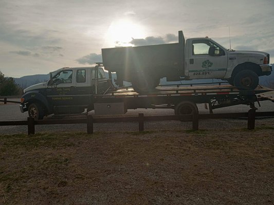 Hauling a dump truck