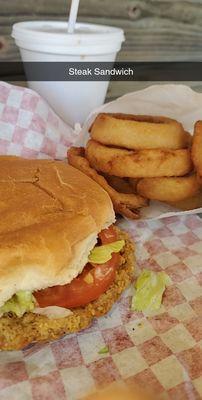 Steak Sandwich and Onion Rings