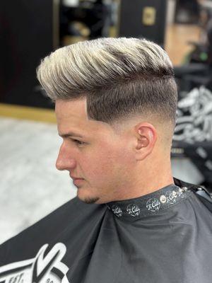 Cuban haircut  with blond  hi lights