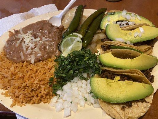 Taco plate with avocado slices. Delicious.