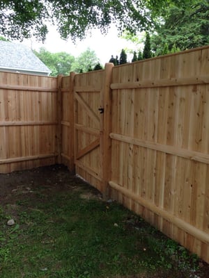 Beautiful new cedar fence with custom gate!