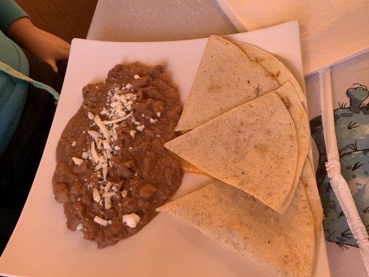 Cheese Quesadilla (appetizer menu) with a side of beans