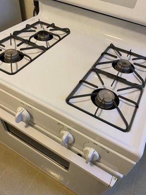 this stove is 107 years old. When I moved in, there were burnt on brown marks and I figured that's just how it is. Vilma made it like new.