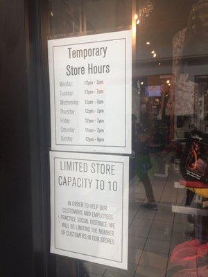 Store hours and limit number of folks inside store. If you don't have a mask, they will provide you with one.