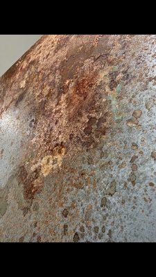 Details of Luminore rust on a custom door.