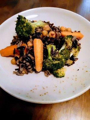 Wild Rice Stir Fry. Black wild rice stir fry with oven roasted carrots, broccoli, and chick peas. Tossed in a savory herb dressing.