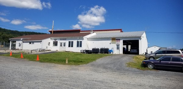 Office and shop, up a bit and across from Quick Check.