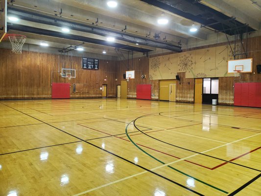 Gym used for organized basketball games, pickleball, and some larger group classes.