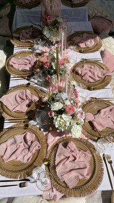 Floral centerpieces + table settings (ask us about rental options)