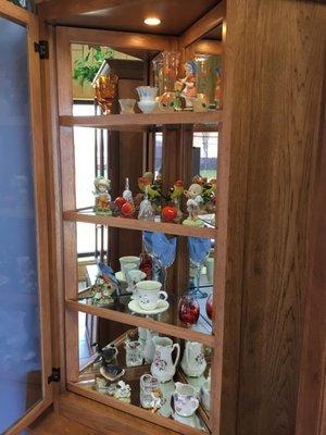 Beautiful curio Cabinets with hidden Gun Cabinets.