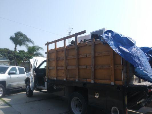 Commercial dump truck, over 440 cubic feet of open top hauling space, lift gate & winch