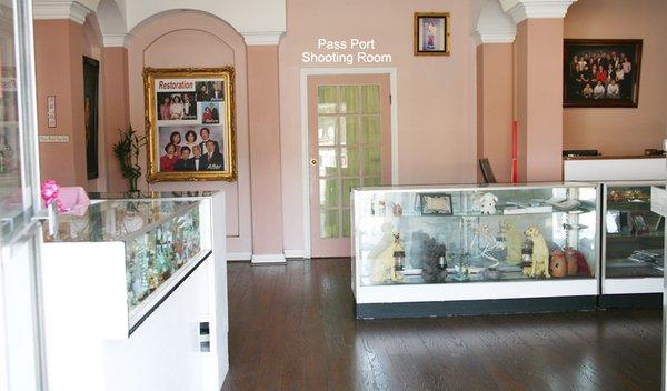 Interior of business. Looking in front is the Passport Photo Room.