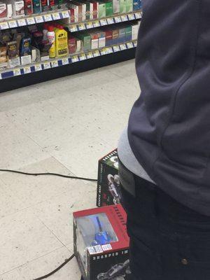 This is the cashier and showing his underwear