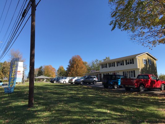 Shampoochie is on the right of this yellow building at the ground level. Look for shampoochies pet groomer signs on 208 south of downtown