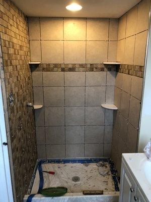 Not only do we do tile flooring, but we also do backsplash and shower surrounds!