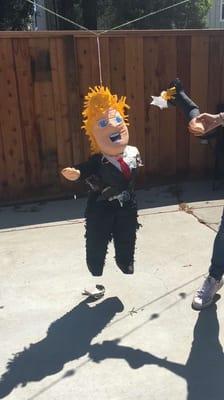 The Trump piñata after a few swings.