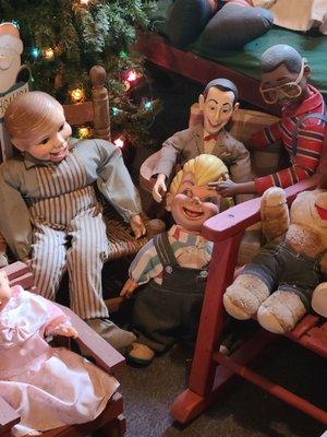 A close up of a scene from a doll room