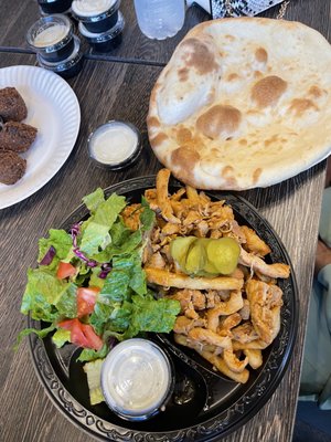 Chicken shawarma platter (rice subbed for fries). With naan on the side.