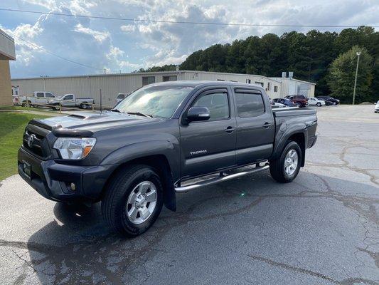 I found what I was looking for. A "slightly" used 2015 Toyota Tacoma 4WD TRD Sport.