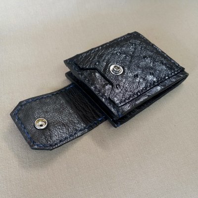 Black compact wallet.