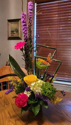 Stalks of Heather, mums, Rose and more.