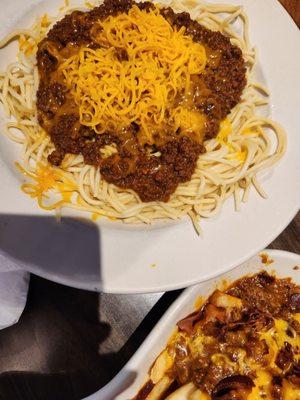 Charlie's special, chili and cheese over spaghetti