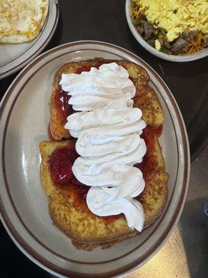 French toast with strawberries and whipped cream