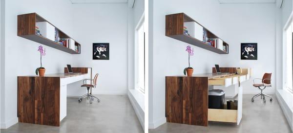 This built-in desk features a lengthy 9 foot desktop with a 3 foot standing desk to one end and a matching walnut bookcase ab...