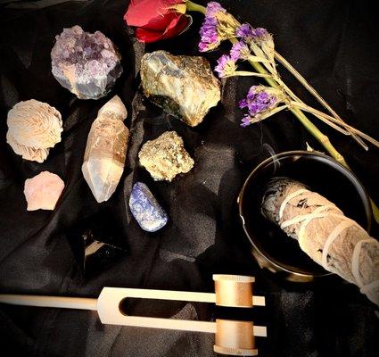 Healing crystals, sage, and sound