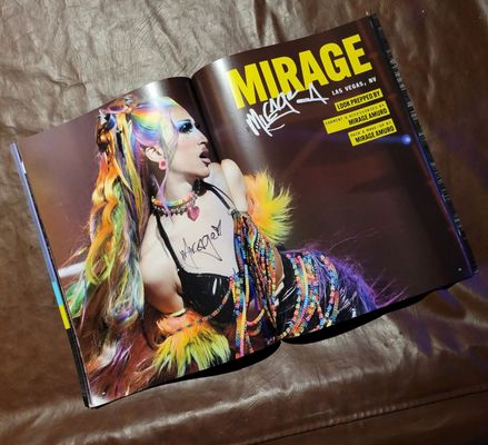 Mirage signed my RuPaul's Drag Race Season 16 Limited Edition Lookbook.