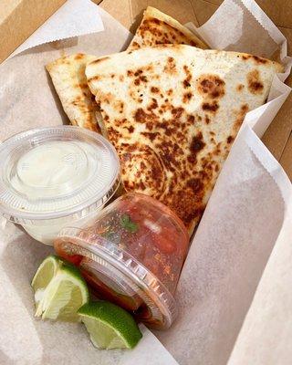 Chicken quesadilla with pico de gallo and crema