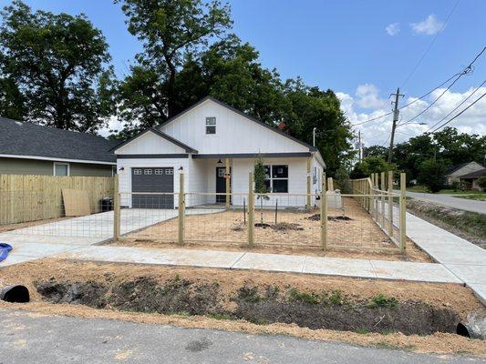 Grading, fence, trees