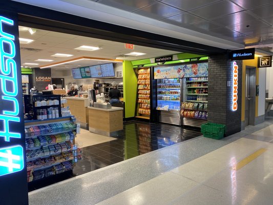 All-new Dunkin' location next to/combined with Hudson News, across from Gate C20