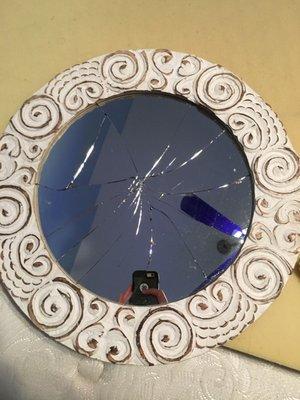 Broken Mirror. Not wrapped. If you click on "not recommended reviews" you'll see my review