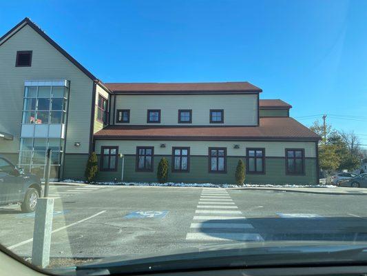 Parking lot view of the front of the building.